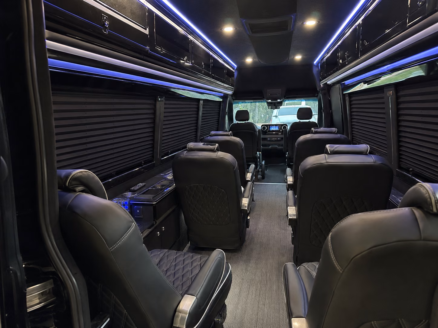 tucson sprinter van with driver inside
